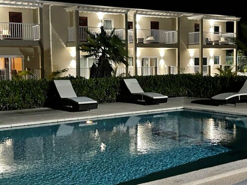Checkers Vacation Homes, Забронировать Апарт-отель Апарт-отели Провиденшиалс, Апарт-отель