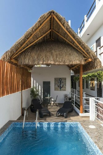 Coconut Hotel Boutique, Забронировать Отель Плая-дель-Кармен Кинтана-Роо, рядом с Пляжный клуб Mamitas
