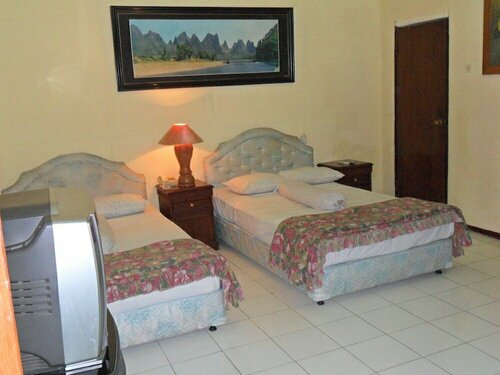 Oyo 1614 Hotel Mandala Puri, Rezervovat Hotel Malang hotely se snídaní, blízko Velodrome Malang, Snídaně
