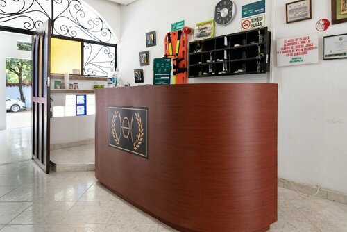 Hotel Ayenda Quirinal, Забронировать Отель Отели в центре Нейва, в центре