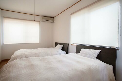 Guesthouse ILOHA, Забронировать Дом для отпуска Kita Ward 