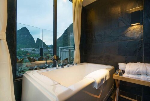 Sea Lily Yangshuo Riverside Resort, Забронировать Курортный отель Отели Яншо с завтраком, Завтраки