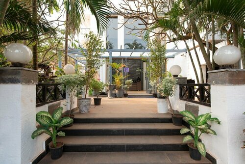 Living Room by Seasons Hotels, Book Hotel Goa hoteller med pool, Swimmingpool