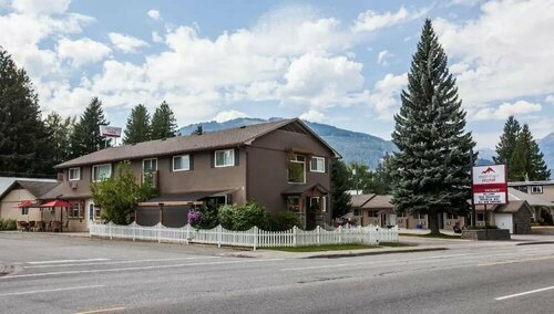 Swiss Chalet Motel, Забронировать Шале Ревелсток Ревелсток