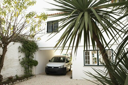 Cushy Apartment with garden in Estoril, Забронировать Апартаменты/квартира Эшторил Estoril Coast