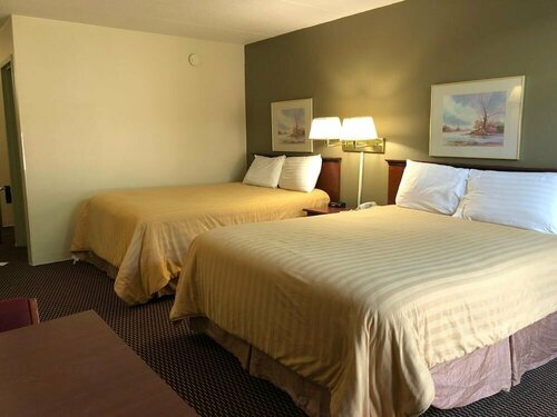 Norwood Inn Worthington, Забронировать Отель Уортингтон штат Миннесота