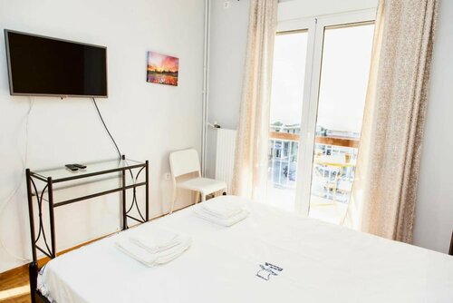Cozy apt in the center of Athens, Забронировать Апартаменты/квартира Неос-Космос Афины