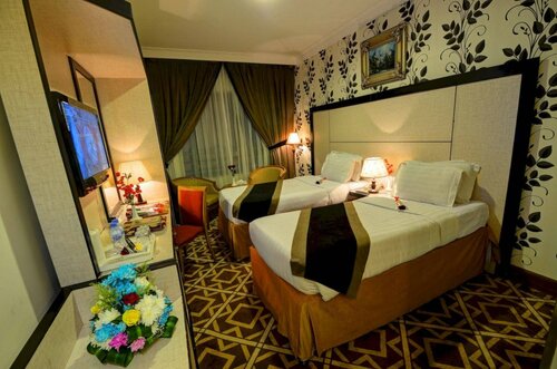 Zowar Alalami Hotel - فندق زوار العالمي, Забронировать Отель Отели Медины 3 звезды, рядом с Ворота Умар ибн аль-Хаттаба в мечети Масджид ан-Набави, 3*
