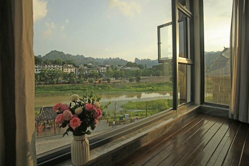 Riverside Peak Lodge Zhangjiajie Wulingyuan National Park, Забронировать Бутик-отель Отели Чжанцзяцзе с завтраком, Завтраки