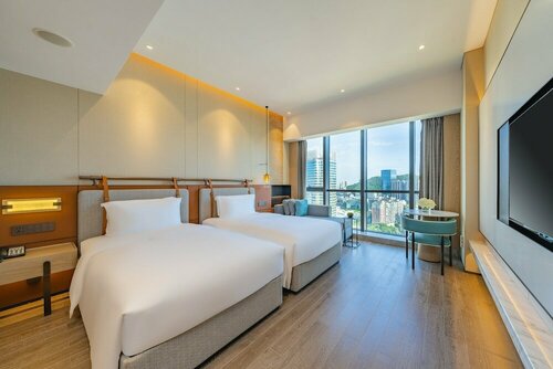 Holiday Inn Zhuhai City Center by IHG, Забронировать Отель Чжухай Гуандун, рядом с Zhuhai Seaside Park