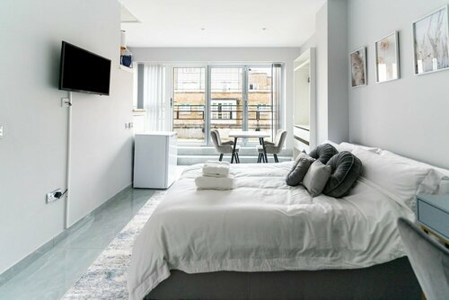 Canary Wharf O2 Deluxe Ensuite Rooms, Забронировать Гостевой дом Отели Большого Лондона с парковкой, Парковка