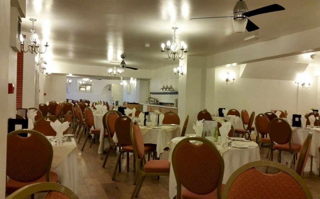 Oyo The Strand Hotel