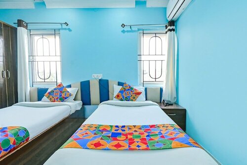 Capital O Good Luck Residency Hotel, Rezervovat Hotel Guváhátí Assam