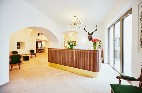 Boutique Hotel Zum Goldenen Hirschen, Забронировать Отель Гмунден 