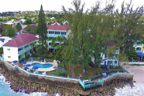 Blue Orchids Beach Hotel, Boek Hotel Worthing Barbados