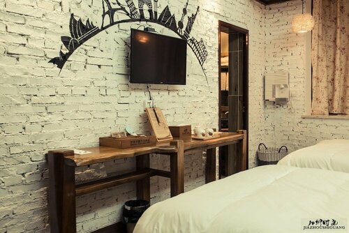 Hotel California Zhangjiajie, Забронировать Гостевой дом Йонг Дин 