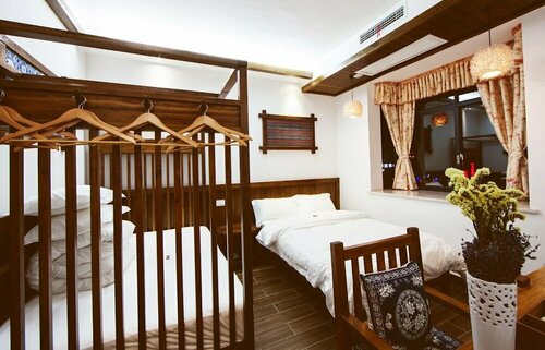 Hotel California Zhangjiajie, Забронировать Гостевой дом Йонг Дин 