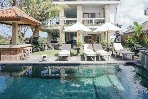 Agung Homestay Canggu Mitra RedDoorz, Забронировать Отель Недорогие отели провинции Бали, недорого