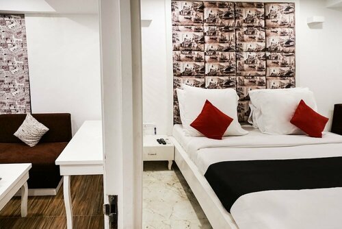 Capital O 48482 Hotel Tribecca Inn, Забронировать Отель Вастрапур Ахмадабад