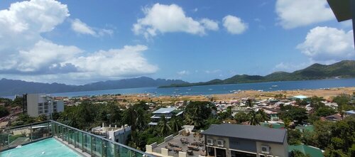 Sky Garden Hotel, Забронировать Отель Coron Town Proper 