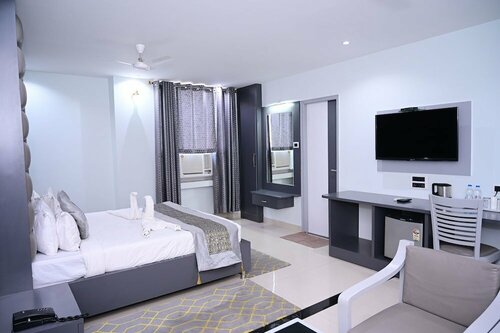 Hotel Dolphin International, Забронировать Отель Отели Варанаси 3 звезды, 3*