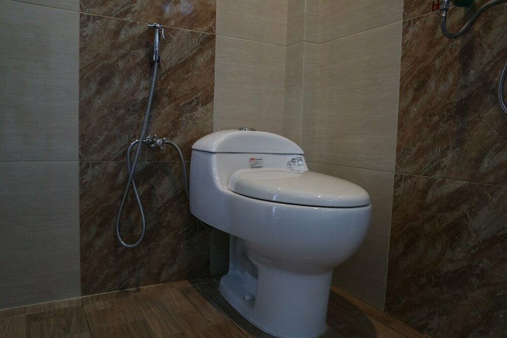 Oyo 1648 Penginapan Three Joye