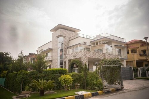 Canadian Inn Islamabad, Забронировать Отель E-11 Sector Исламабад