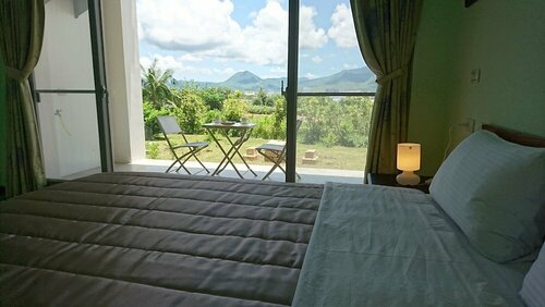 Kuan Min B&B, Забронировать Отель «постель и завтрак» Dehe Hengchun Township