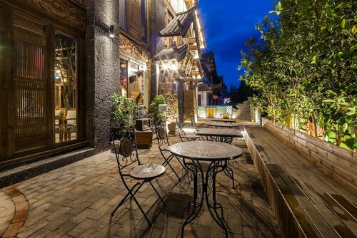 Blooming Island Dongan Branch, Book Hotel Hoteller i Lijiang med parkering, Parkering