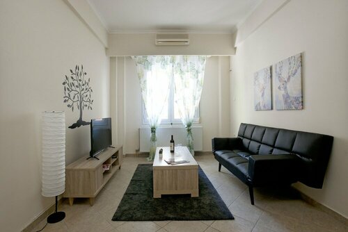Comfortable Apartment At The Foot of The Odeon of Herodes Atticus, Забронировать Апартаменты/квартира Неос-Космос Афины
