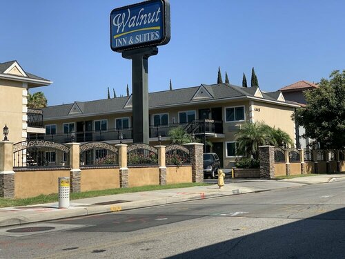 Walnut Inn & Suites West Covina, Забронировать Мини-отель Уэст-Ковина Большой Лос-Анджелес