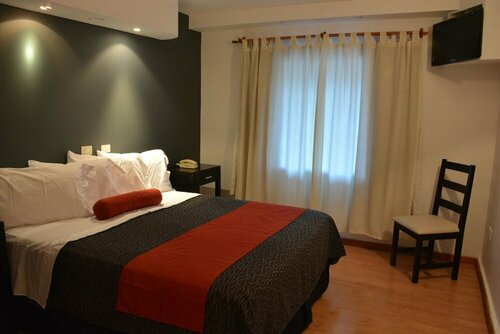 Piazza Hotel, Забронировать Отель Вилья-Карлос-Пас Punilla Valley