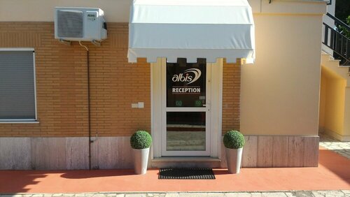Albis Rooms Guest House, Забронировать Гостевой дом Отели в центре Фьюмичино, в центре