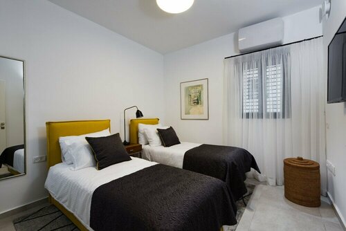 Contemporary & Texture-Rich Hideaway, Забронировать Апартаменты/квартира Апартаменты Тель-Авива, Апартаменты/квартира