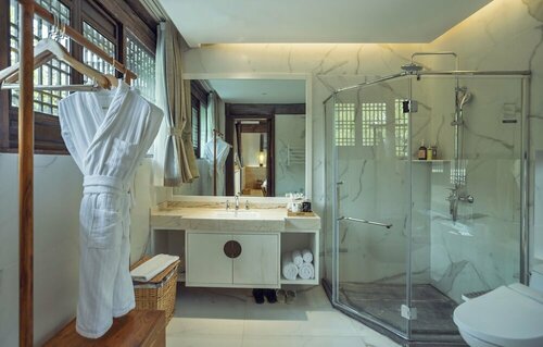 Lijiang Qilu Garden Hotel, Забронировать Отель Лицзян Юньнань