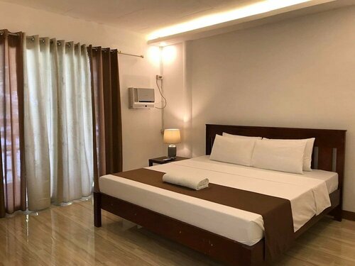 Santander Pebble Beach Resort, Забронировать Курортный отель Сантандер провинция Себу