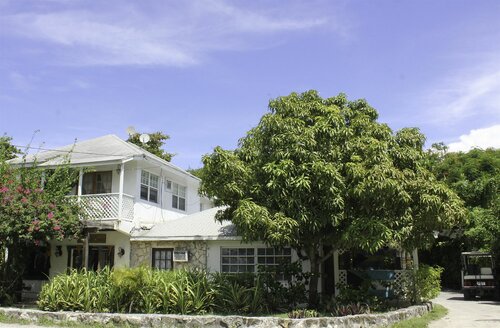 Tingum Village Hotel, Réserver Hôtel Dunmore Town Bahamas