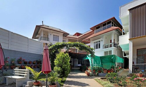 Treebo Vrindavan, 3 Km From Madikeri Fort, Забронировать Отель Отели штата Карнатаки с парковкой, Парковка