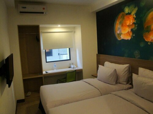 Top Hotel Manado by Gran Puri, Забронировать Отель Манадо провинция Северный Сулавеси