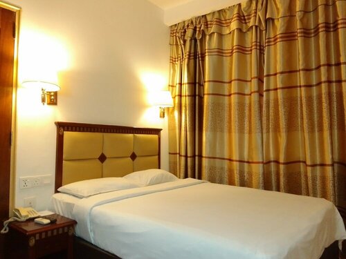 Super OYO 90464 Borneo Suites Hotel, Reserva ahora Hotel Kota Kinabalu 