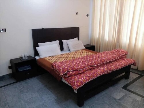 Kashmir Inn Hotel, Забронировать Отель Музаффарабад штат Джамму и Кашмир