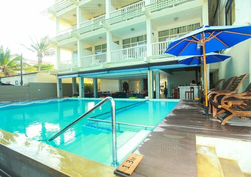 Beacon Beach Hotel, Забронировать Отель Отели Округа Гампаха с завтраком, Завтраки