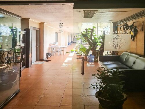 OYO 679 Ddd Habitat Pension House, Prenota Hotel Hotel a Mindanao con parcheggio, Parcheggio