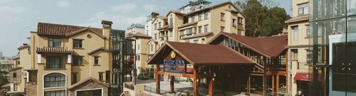 Tulip Inn Guiyang Huaxi Hotel, Забронировать Отель Хуаси Гуйян