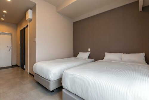 Mr.KINJO in GRAND BLUE CHATAN, Prenota Hotel Hotel a Okinawa con parcheggio, Parcheggio