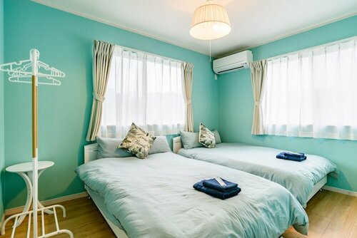 Grandioso Onna II, Забронировать Отель Отели Онна с парковкой, рядом с Парк Onna Seaside Park Nabii Beach, Парковка