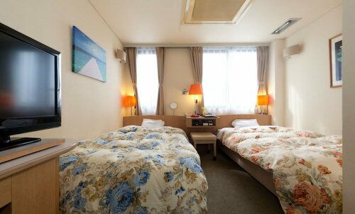 Hotel Sun Garden Matsuyama, Забронировать Отель Недорогие отели Мацуяма, недорогие