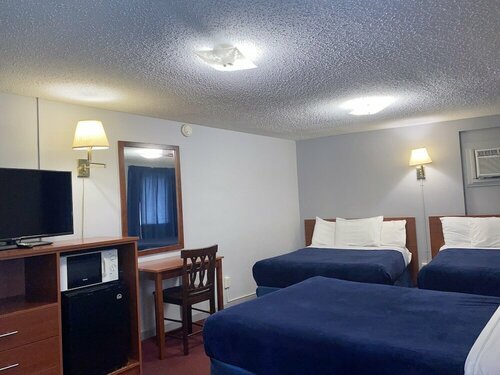 Swiss Cottage Inn, Забронировать Дом для отпуска Ниагара Фолс Буффало, рядом с Торговый центр Fashion Outlets of Niagara Falls