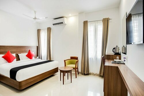 Capital O 60558 Hotel Midhuna International, Забронировать Отель Адур штат Керала