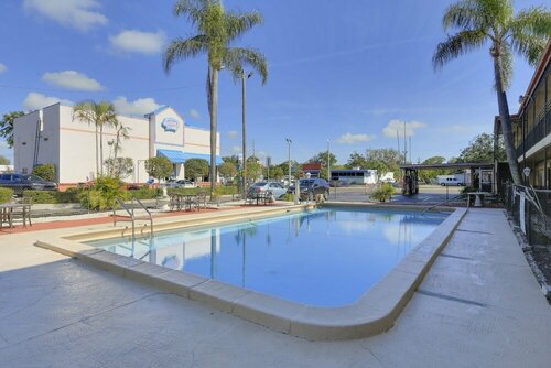 Econo Lodge St Petersburg Central, Забронировать Мини-отель Сент-Питерсберг Pinellas County